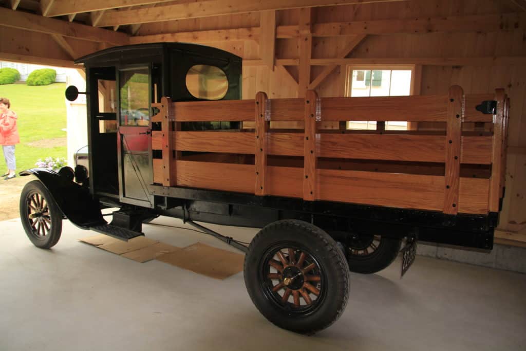 Image of an old truck parked in the Village Garage